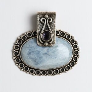 Elegant Silver and Blue Stamped Pendant